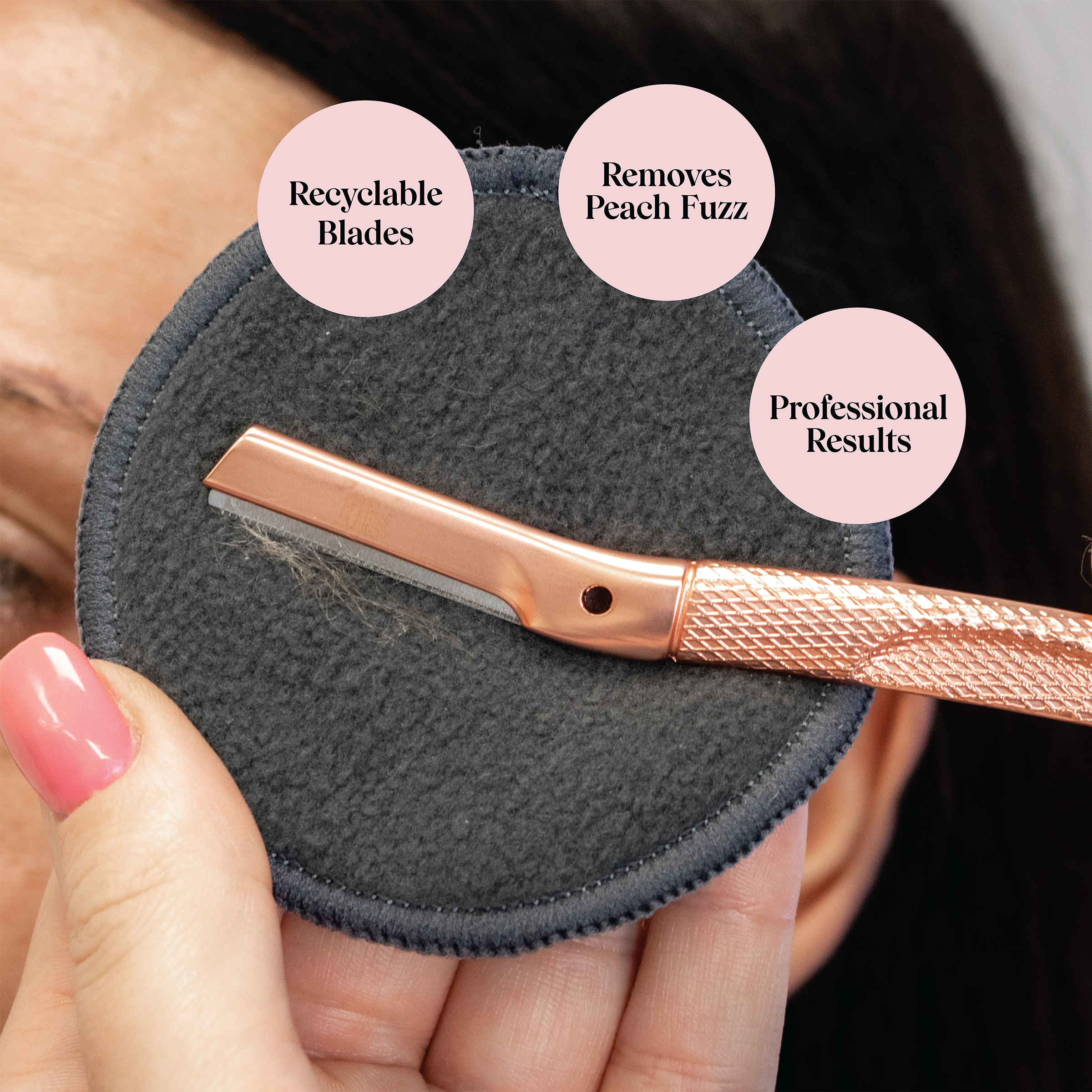 FFS rose gold dermaplaner resting on exfoliating pad with badges: Recyclable Blades, Removes Peach Fuzz, Professional Results